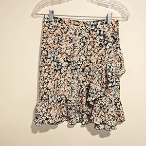 LAUREN CONRAD Floral print ruffle edge skirt side zipper size small. EUC